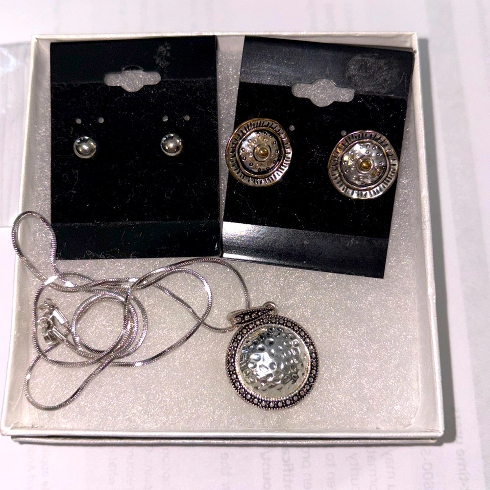 Two pairs of earrings and one necklace